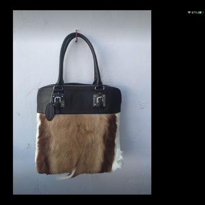 New leather and cowhide bag.